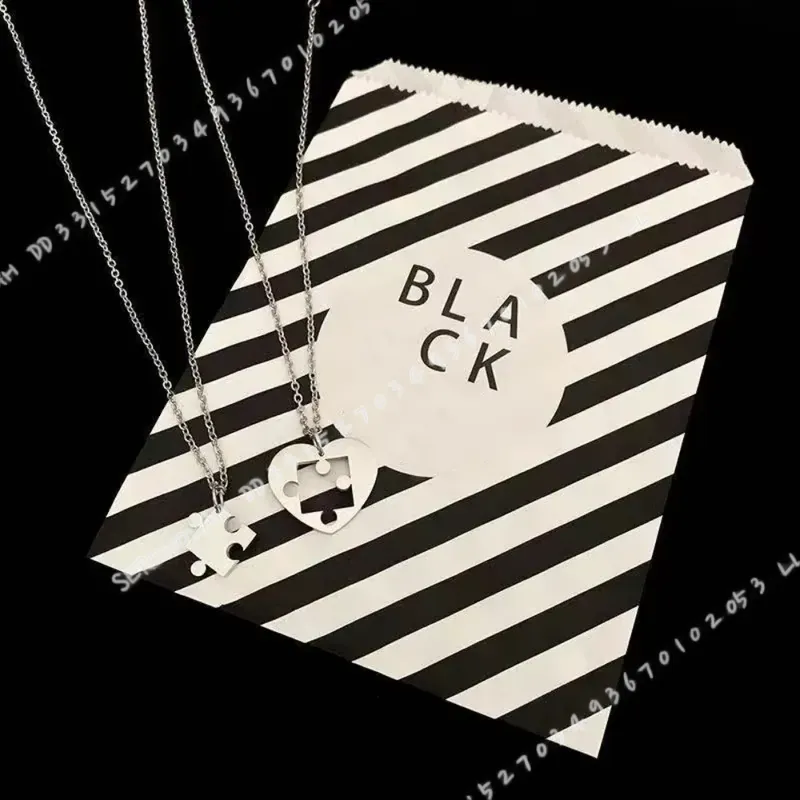 2Pcs Set Simple Puzzle Heart M - Magnetic Couple Matching Necklaces recension och pris