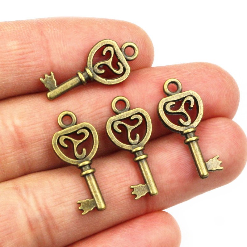 40pcs Key Charms Pendants Anti - Heart Locket Necklace Photo recension och pris